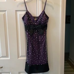 Juniors medium knee length Taboo dress with bow.
